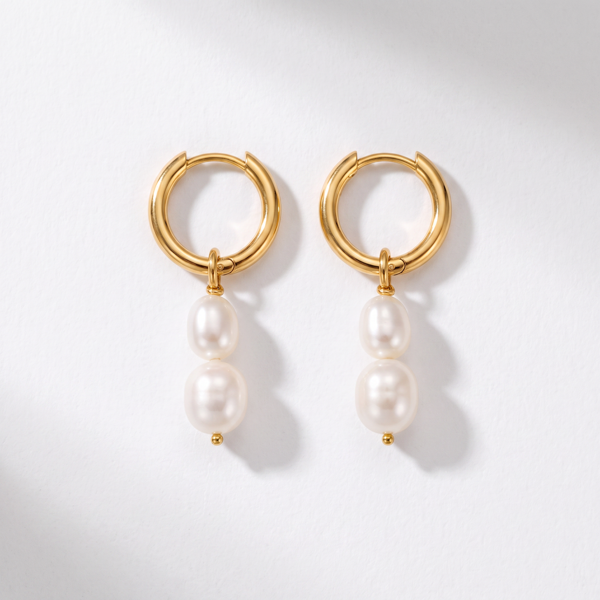 Brincos com Duas Pérolas